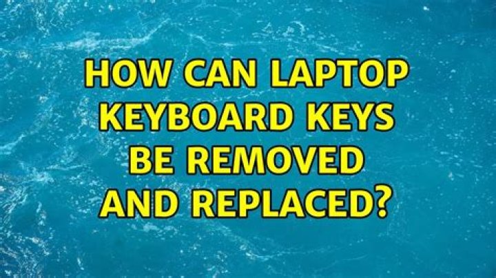 How can laptop keyboard keys be removed and replaced?