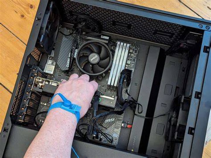 How do I clean dust from a computer?