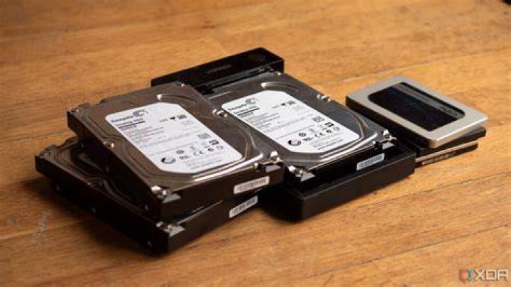 Which partitions should I clone when migrating Windows from HDD to SSD?