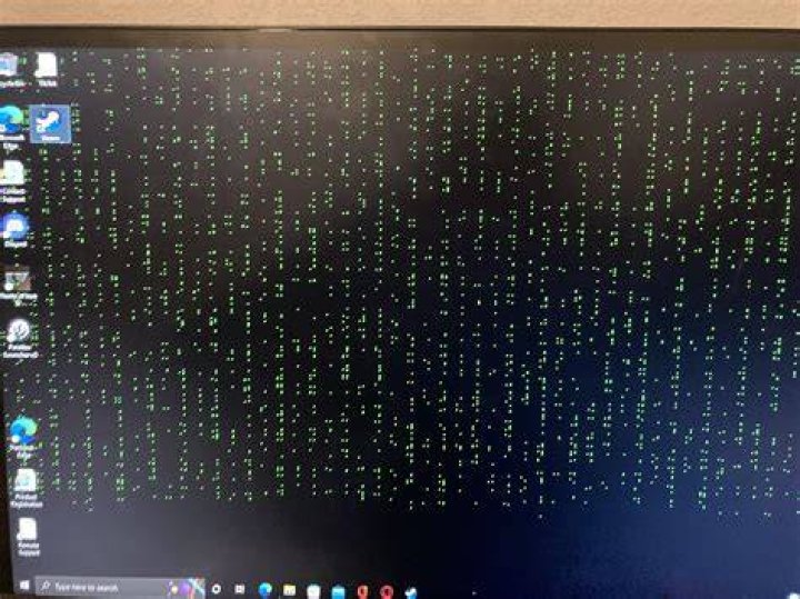 Why am I seeing red dots on my LCD screen?
